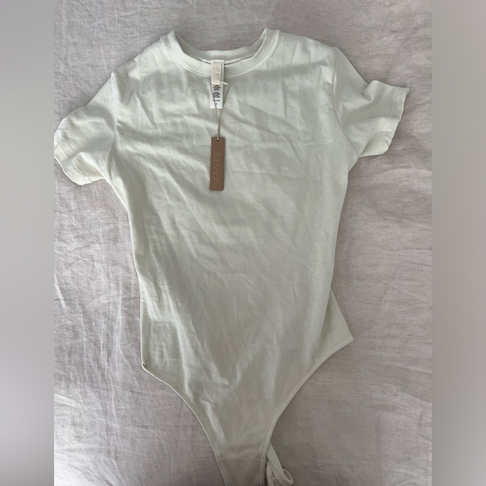 Skims Bodysuit Size small, new with tags, Bone color